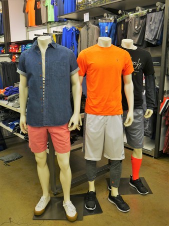 Edison New Jersey - April 1 2017. Summer fashion for young teenage men and boys displayed on mannequins in an apparel storeのeditorial素材