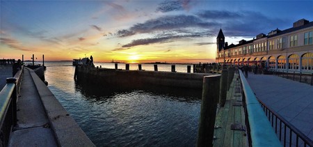New York City - November 26 2015. Sunset at Manhattan Pier A on Hudson River