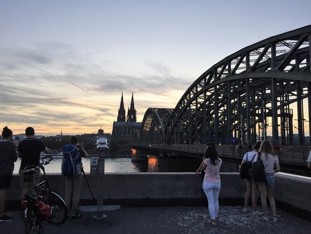 Cologne Germany - September 10 2016. Sunset at the Cologne Cathedral with Hohenzollern Bridge in Cologne, Germany.のeditorial素材