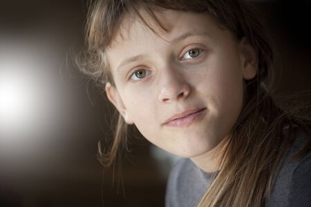 young girl looking curiously - self aware