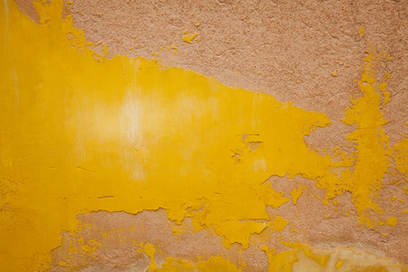 weathered yellow wall photo taken in Venice