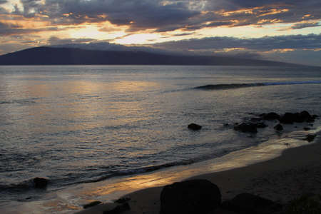 The sun has set on the Maui oceanの写真素材