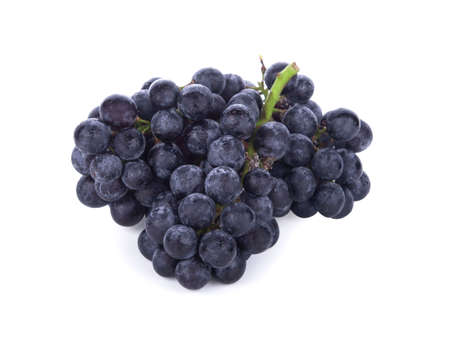 Black seedless grapes isolated on white background