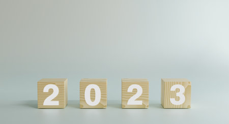 Happy new year 2023, horizontal wood blocks cube or square with number 2023 on white background. New...