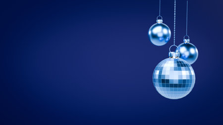 3D rendered blue Christmas or New Year's background featuring three hanging silver and blue mirrored disco ball ornaments on a clean, deep blue background with copy space.の写真素材
