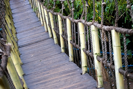 Overhead pedestrian  bridge over riverの写真素材