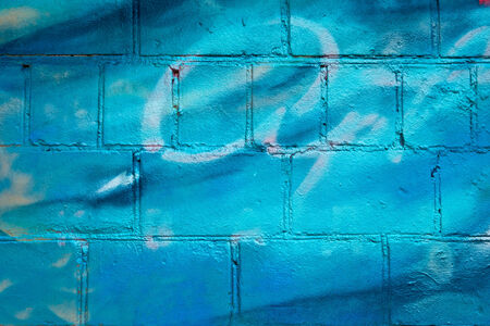 Old brick wall painted as background の写真素材