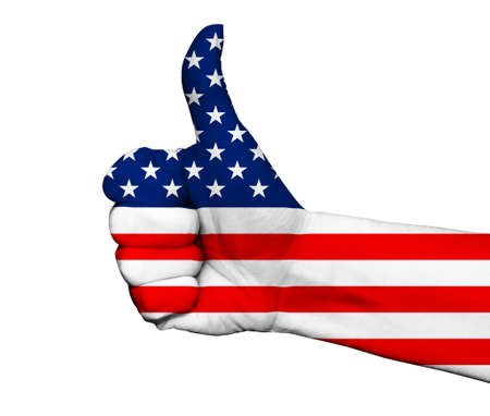 Hand with thumb up painted in colors of United States of America flag isolated on white backgroundの写真素材