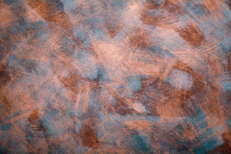 Painted abstract orange concrete plaster wall backgroundの写真素材