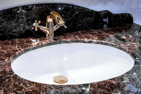 modern bathroom - detail view of ceramic bath sinkの写真素材