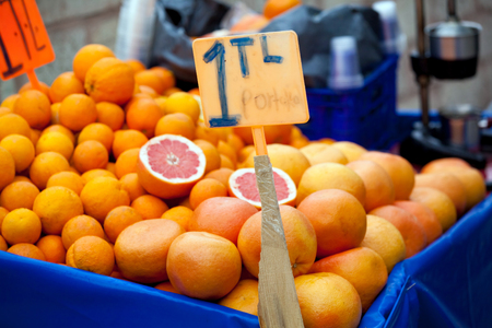 Fresh orange juice selling on the strreet, turkish marketの写真素材