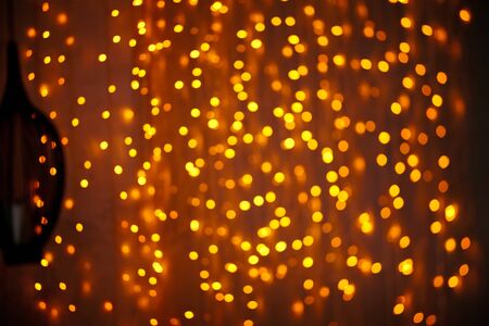 Christmas lights bokeh effect, defocused light backgroundの写真素材