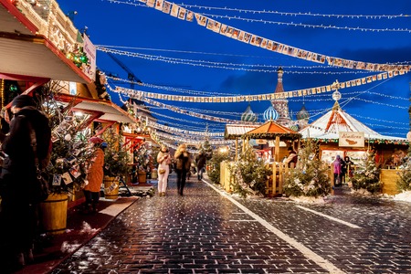 Moscow, Russia - December, 2015: People on Christmas market on Red Square in Moscow city center, Decorated and illuminated Red Square for Christmas in Moscow.のeditorial素材