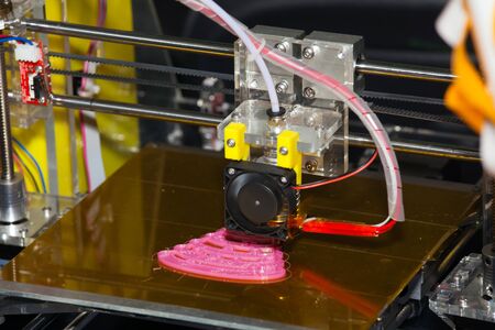 3d printer printing. Close up process of new printing technology