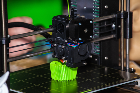 3d printer printing. Close up process of new printing technology