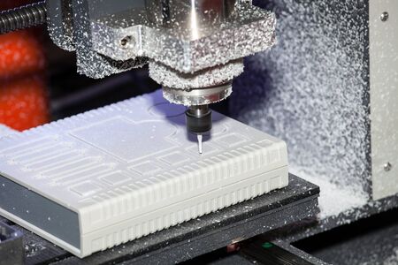 Wood milling machine in action close up process