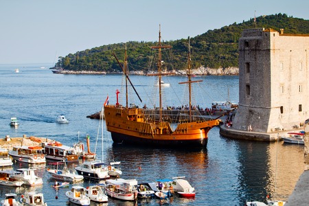 Harbour with ship and small boats in Dubrovnik, Croatia.のeditorial素材