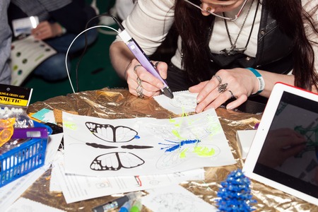 Girl using 3D printing pen