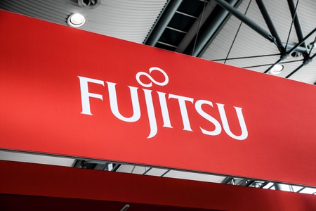 Hannover, Germany - March, 2017: Fujitsu company logo sign on exhibition fair Cebit 2017 in Hannover Messe, Germanyのeditorial素材