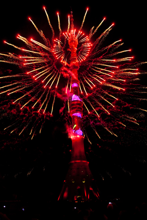 International Festival "Circle of Light". Laser video mapping show on Ostankino TV tower in Moscow, Russia. 3D projection mapping on building and firework showのeditorial素材