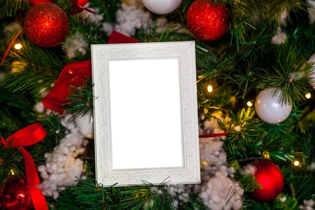 Photo frame in christmas decorated backgroundの写真素材