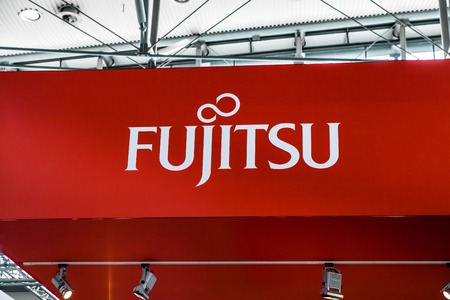 Fujitsu company logo sign on exhibition fair Cebit 2017 in Hannover Messe, Germany