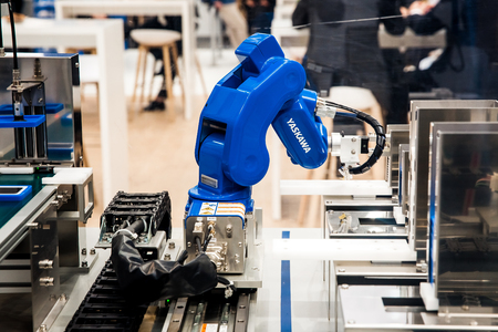 Yaskawa moto mini robot arm on Messe fair in Hannover, Germanyのeditorial素材