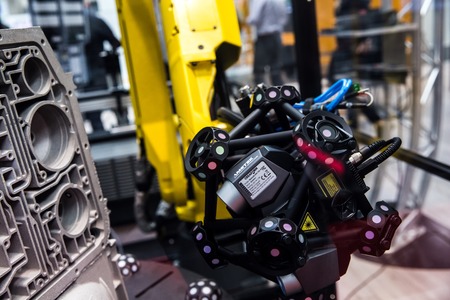 Robot arm with MetraSCAN 3D optical CMM scanning system on Messe fair in Hannover, Germanyのeditorial素材