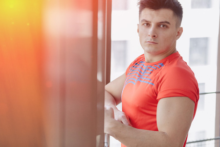 young guy at the window, healthy lifestyle
