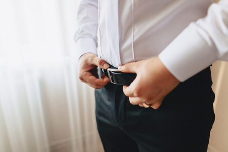 groom morning meeting, details, jacket, shoes, watches and buttons on the wedding dayの写真素材