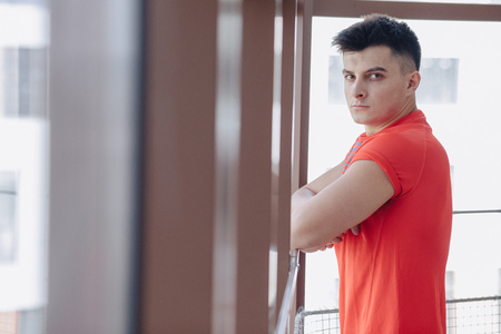 young guy at the window, healthy lifestyle
