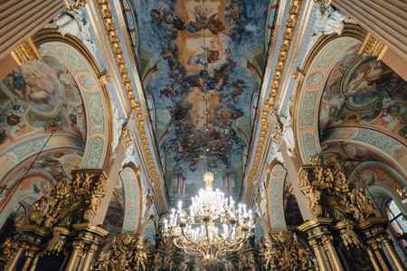 Ternopil, Ukraine - 20 October 2018: Cathedral of the Immaculate Conception of the Blessed Virgin Mary, ceiling and chandelier, editorialのeditorial素材