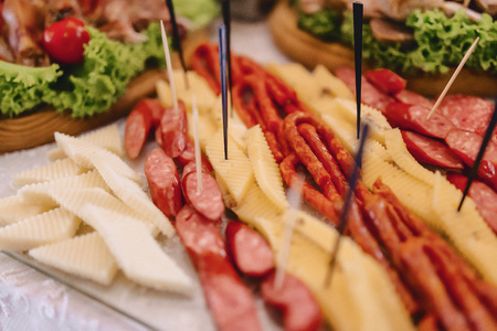 festive salty buffet, fish, meat, chips, cheese balls and other specialties for celebrating weddings...