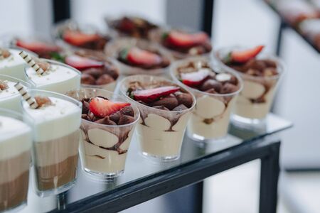 festive sweet buffet with different sweetiesの写真素材
