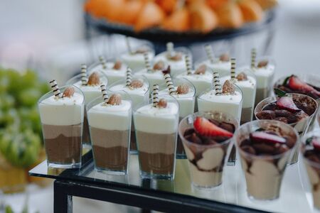 festive sweet buffet with different sweetiesの写真素材