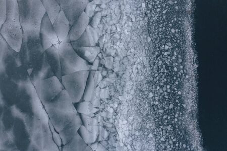 pond on ice, ice, cracked ice, winter lake or pond, aerial shots