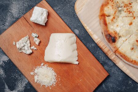 appetizing delicious Neapolitan pizza with cheese. four kinds of cheese. concept of delicious italian pizza.の写真素材