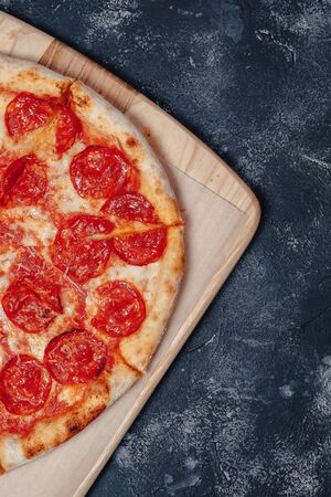 delicious Neapolitan meat pizza on board, pizzeria and delicious foodの写真素材