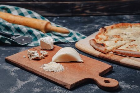 appetizing delicious Neapolitan pizza with cheese. four kinds of cheese. concept of delicious italian pizza.の写真素材