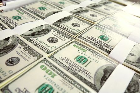 Close-up of million dollars made from lots of hundred billsの写真素材