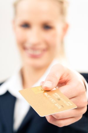 Close-up of plastic credit card in businesswomanÂs hand の写真素材