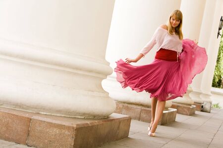 Portrait of smart woman in fashionable clothing looking at camera passionatelyの写真素材