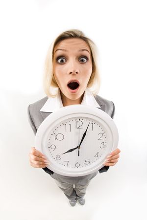 Fish-eye of businesswoman opening her mouth in amusement showing clock