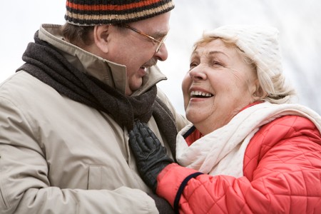 Portrait of happy companions looking at each other with smilesの写真素材