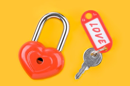 Image of red lock and key with love label の写真素材