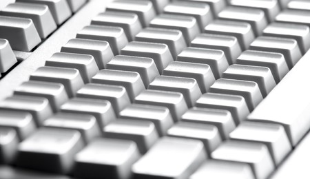 Close-up of four rows of buttons of computer keypadの写真素材