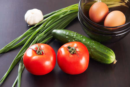 Composition made of vegetables, green onion and eggs の写真素材