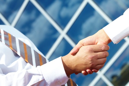 Image of handshaking of business partners outdoorsの写真素材