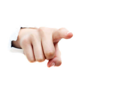 Image of human hand making pointing gesture through torn paper  の写真素材