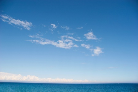 Image of blue sea under azure sky on hot summer day の写真素材